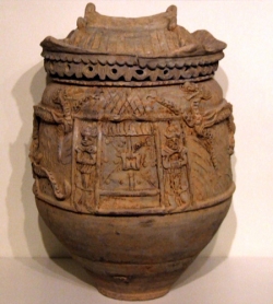 Large Yunnan storage jar decorated as grain store, two guardians, door, beams and roof - courtesy R&G McPherson Antiques